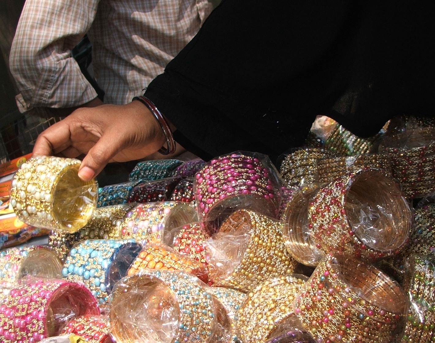Stacks of colorful chooriyan bangles