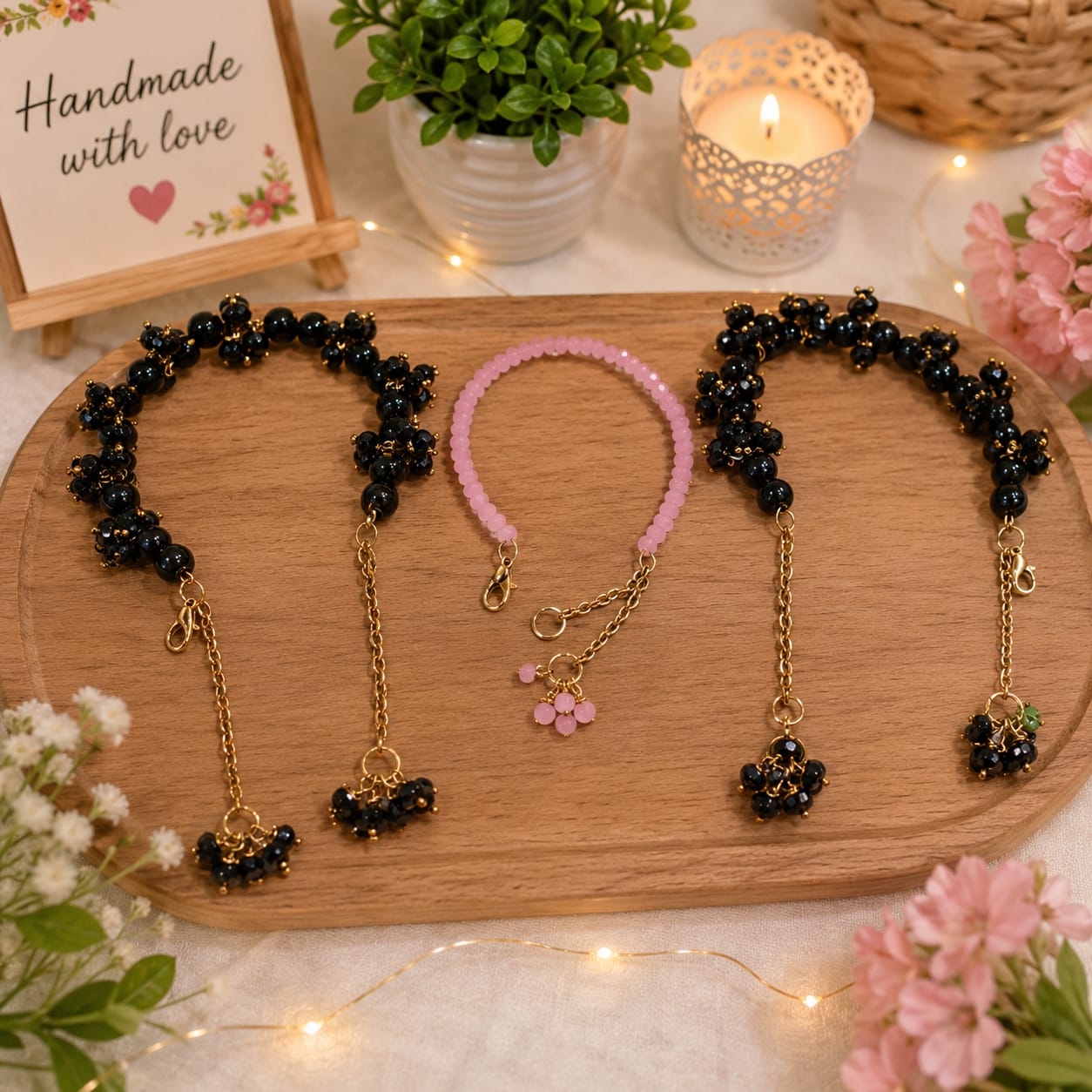Handmade black beaded bracelet and anklet set with pink bracelet