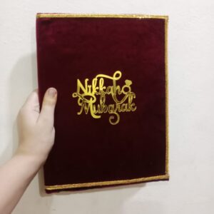 Maroon velvet Nikkah Mubarak booklet cover with gold lettering